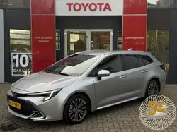 Toyota Corolla Touring Sports Getinte ramen, Inductieladen voor smartphones, Stoelverwarming, Parkeerhulp achter, Lendensteun, Alarm, Lichtmetalen velgen, Garantie