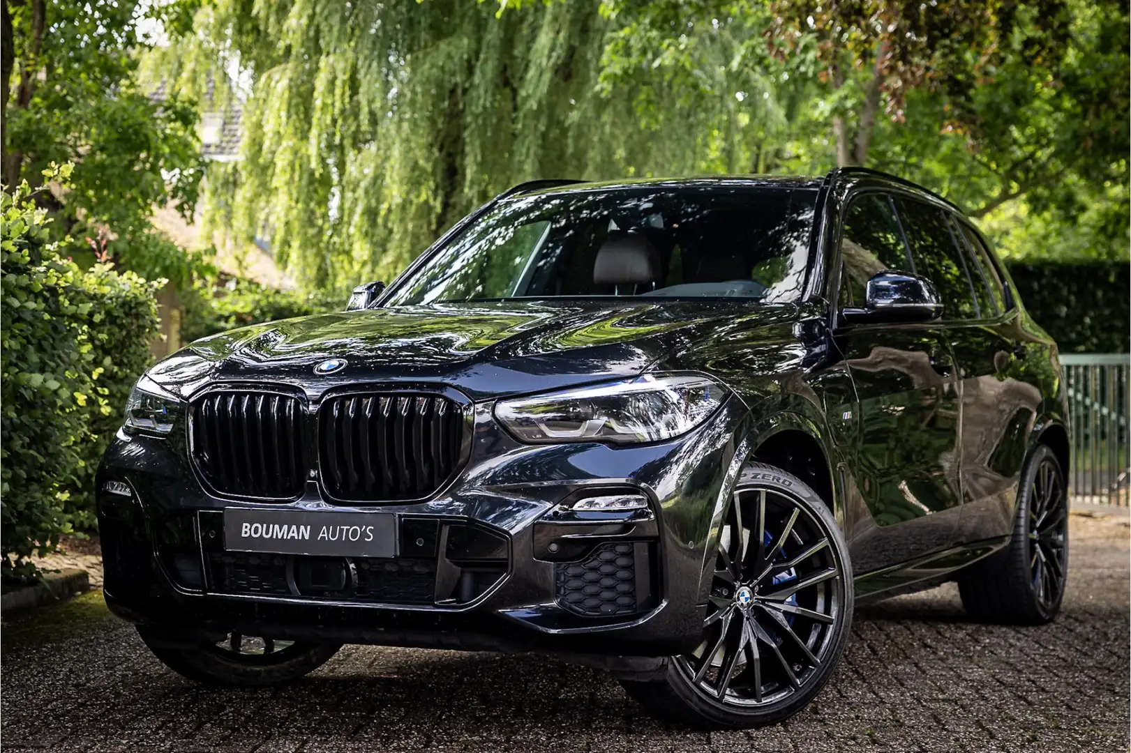 BMW X5 xDrive45e M Sport Individual 22" Crafted Clarity H Zwart - 1