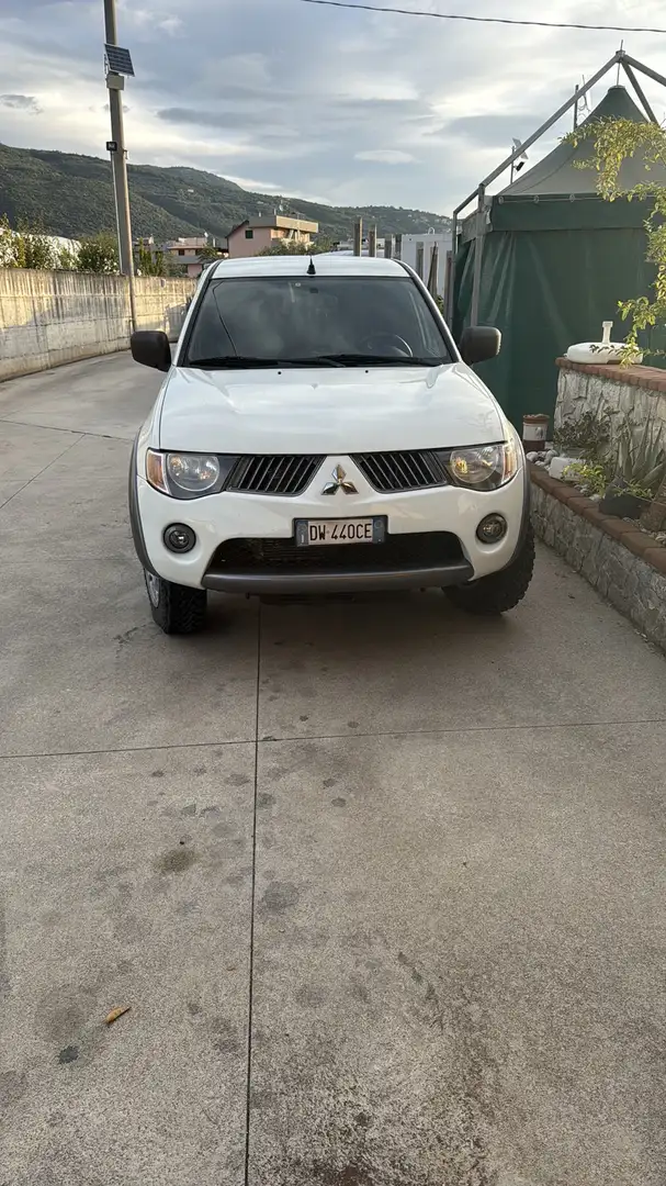 Mitsubishi L200 d.cab 2.5 di-d Insport - 1