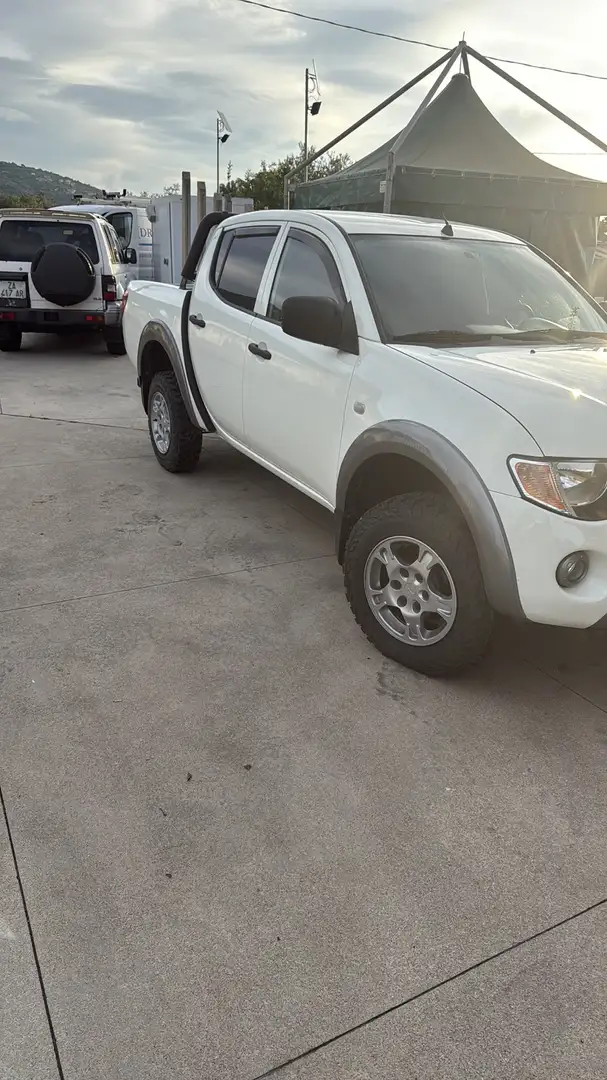 Mitsubishi L200 d.cab 2.5 di-d Insport - 2