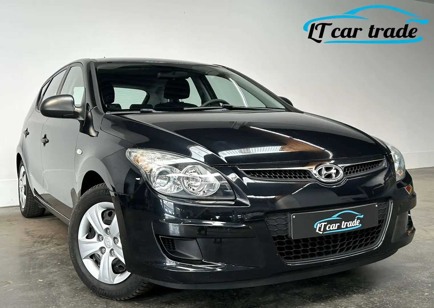 Hyundai i30 1.4i Style * Airco * Radio cd mp3 * Garantie Noir - 1