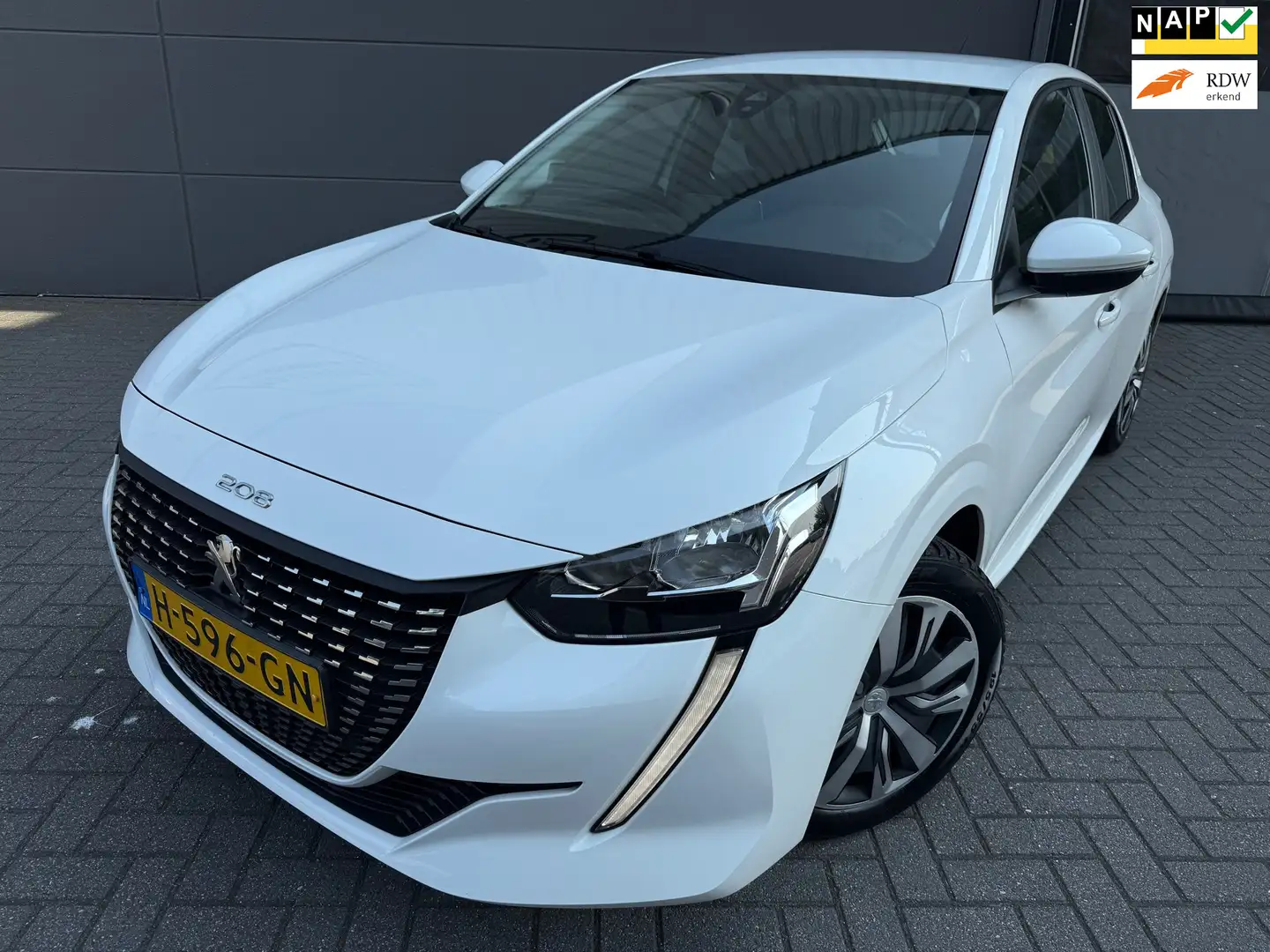 Peugeot 208 1.2 PureTech Signature*CAR PLAYE*NAVI*CRUISE*AIRCO Wit - 1