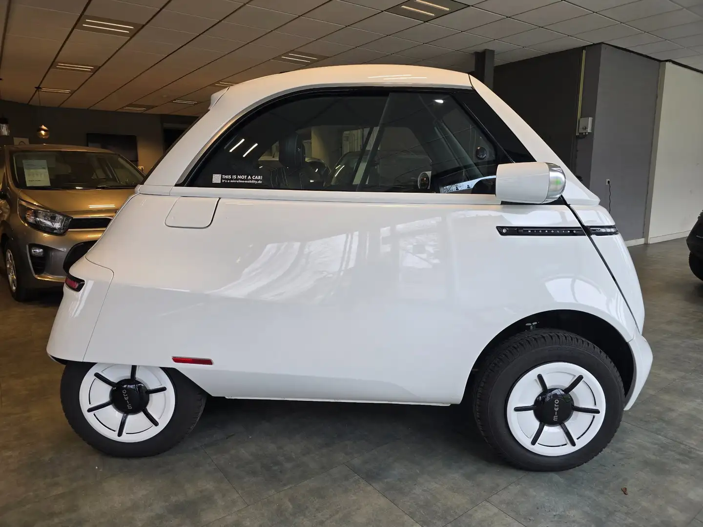 Micro Microlino Microlino Competizione 10.5 kWh L7 177 Km. 90 Km/u Weiß - 2