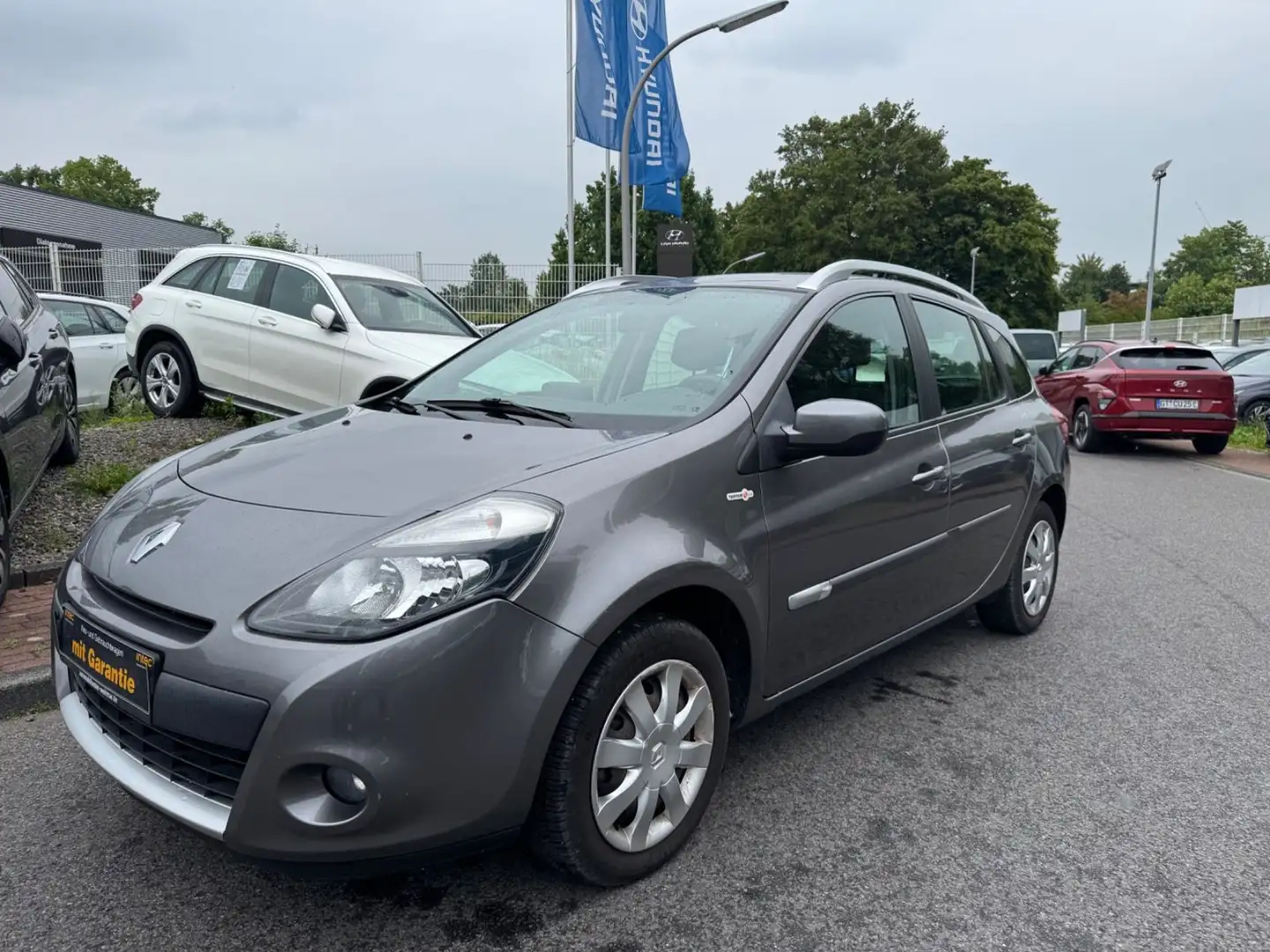 Renault Clio CLIO/76KW/TOM TOM/2.HD/KLIMA/NAVI/AHK/TÜV-NEU!!! Grau - 1
