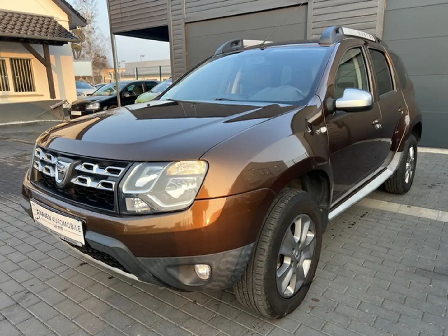 Dacia Duster Prestige 4x2+Allwetter+Klima+Navi+Tüv+ Brun - 1