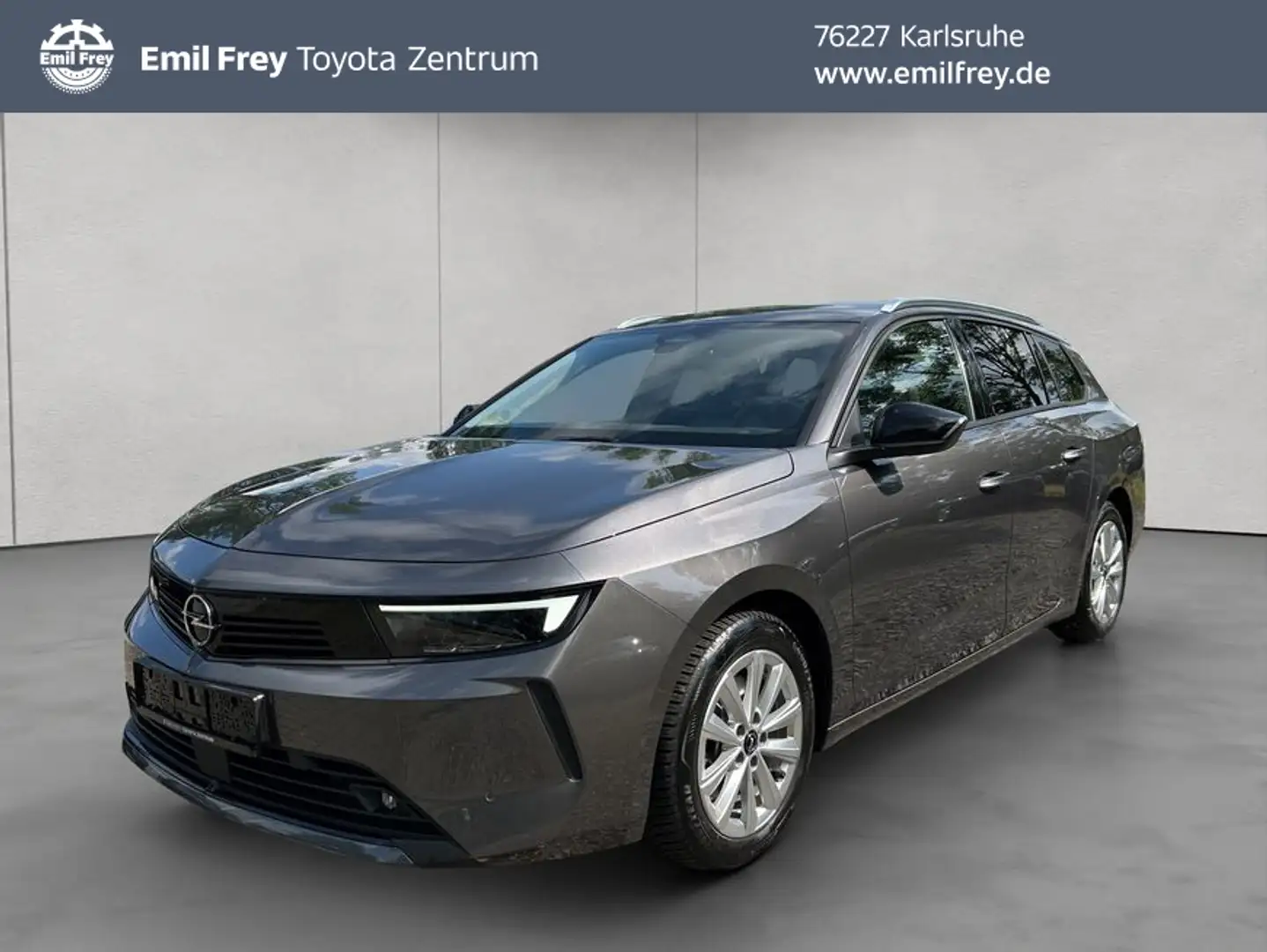 Opel Astra ST 1.2 T AT Elegance AHK Navi LED AGR Grijs - 1