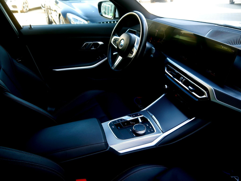 BMW 320 e M-Sport *Parkassistent - Widescreen* — photo 12