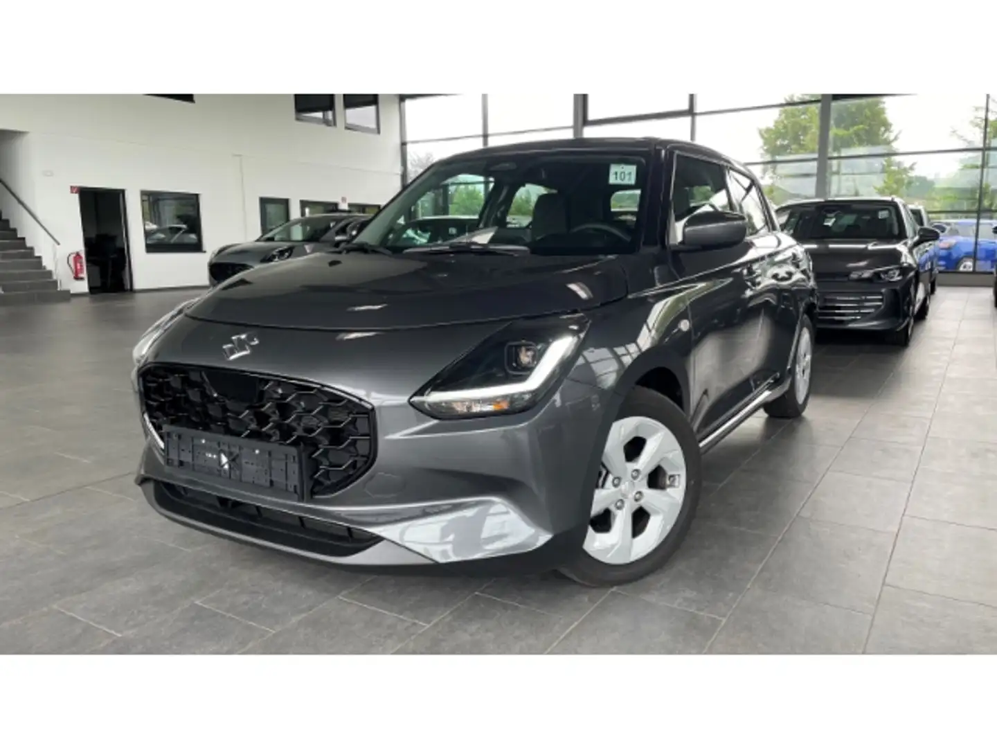 Suzuki Swift 1.2 Comfort Navi LED ACC Kamera SitzHZG Carplay Ke Grijs - 1