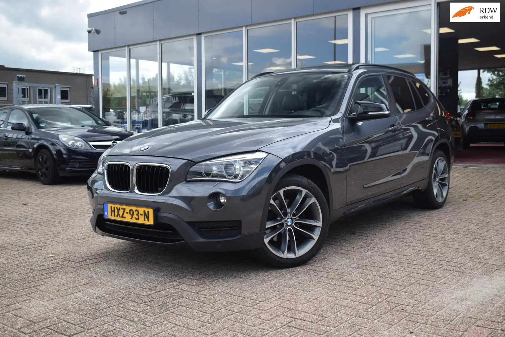 BMW X1 XDrive20i AUTOMAAT|PANO DAK|XENON|LEDER|NAVI||CRUI Gris - 1