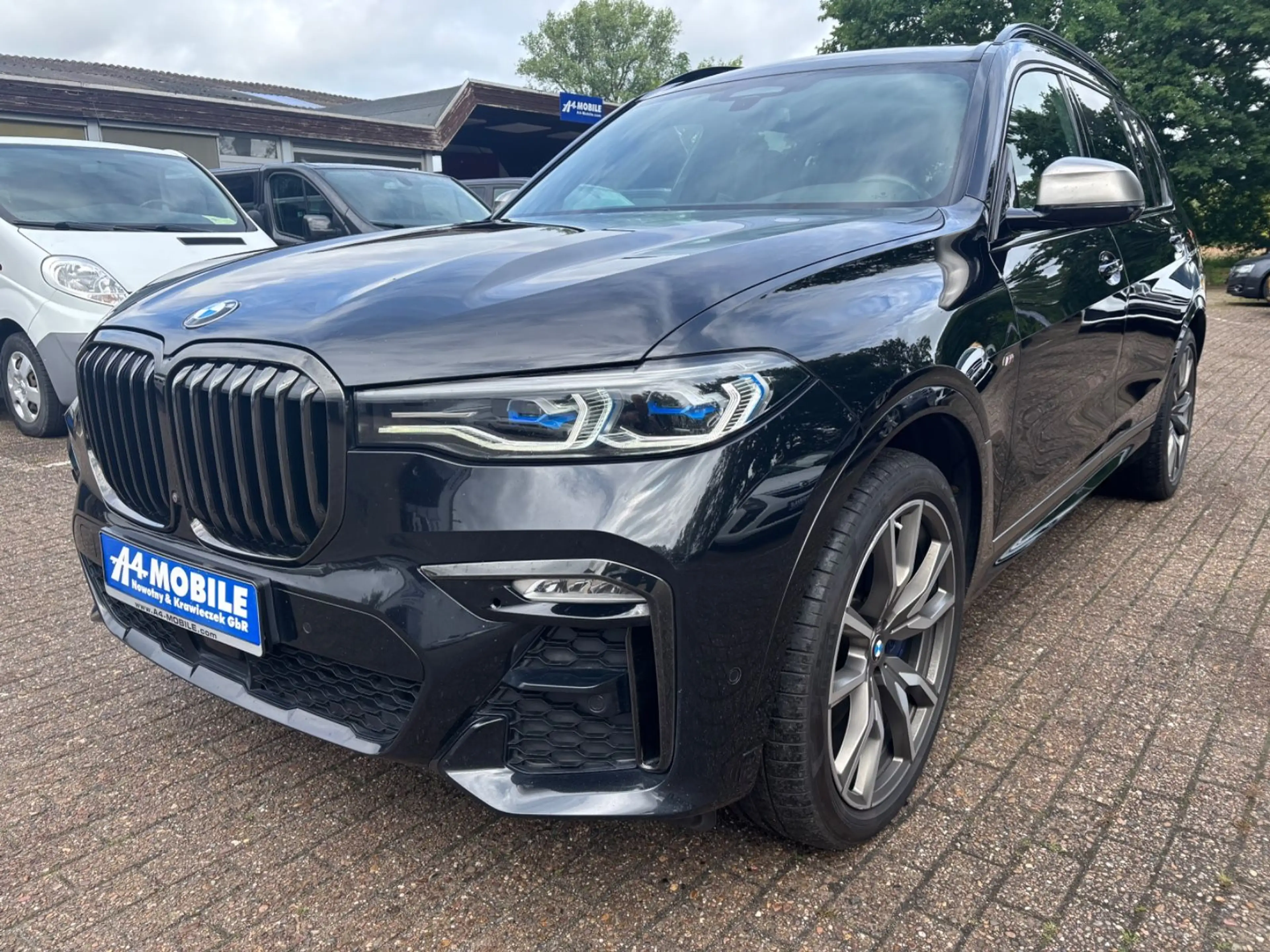 BMW X7 M50d M-Paket 7 Sitze Laser Pano TV *Voll* — photo 13