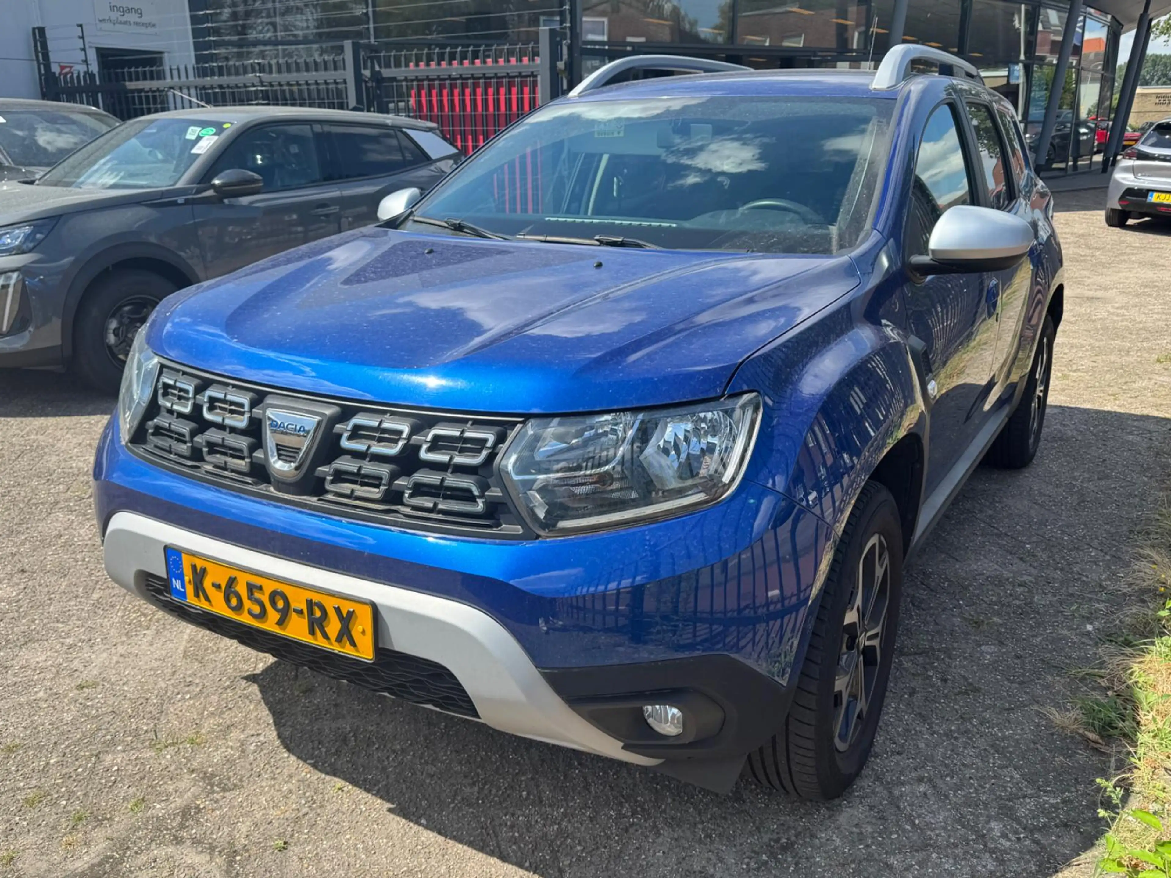Dacia Duster TCe 90 Prestige | Trekhaak | Navigatie | Climate C — photo 2