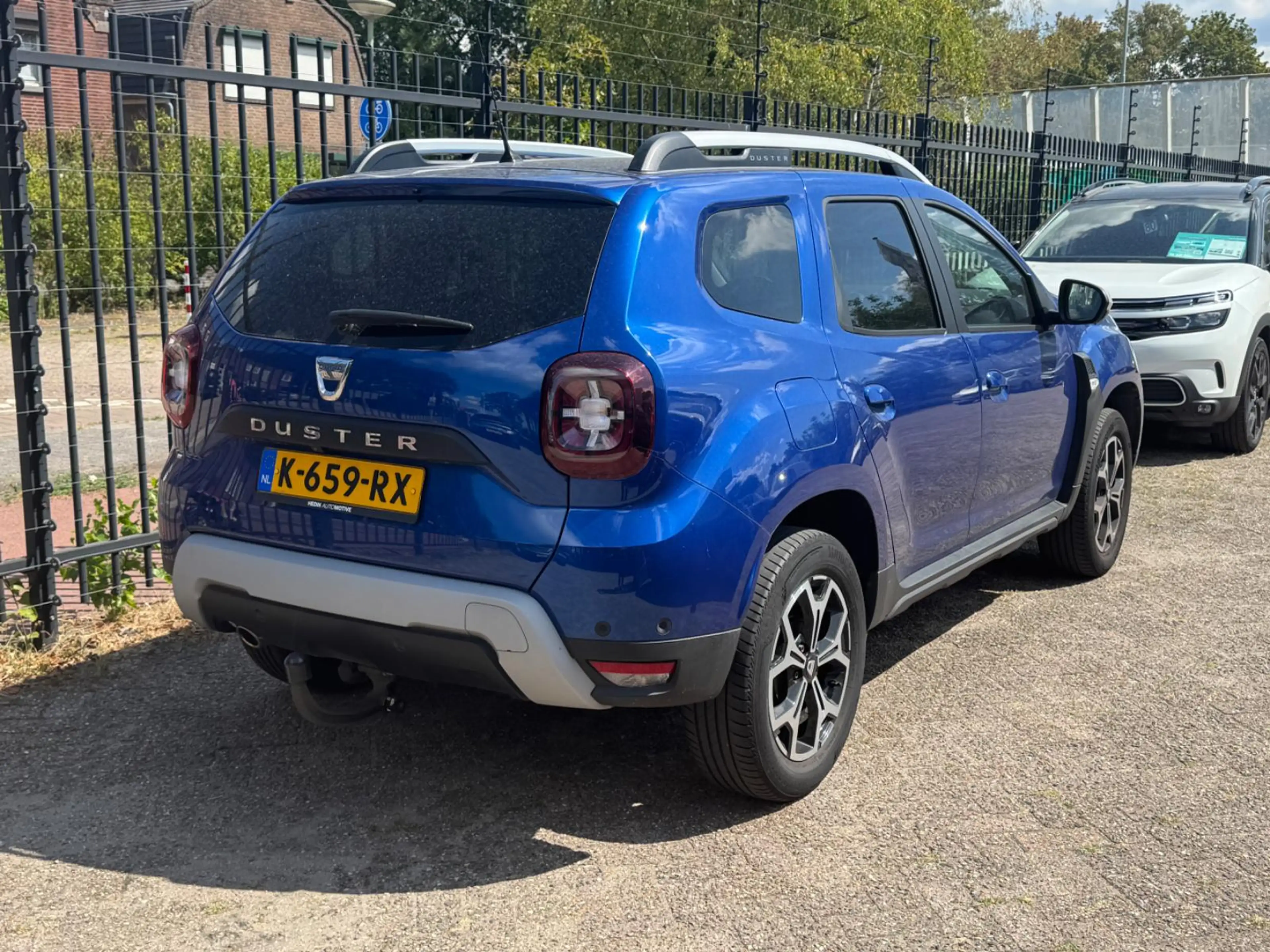 Dacia Duster TCe 90 Prestige | Trekhaak | Navigatie | Climate C — photo 4