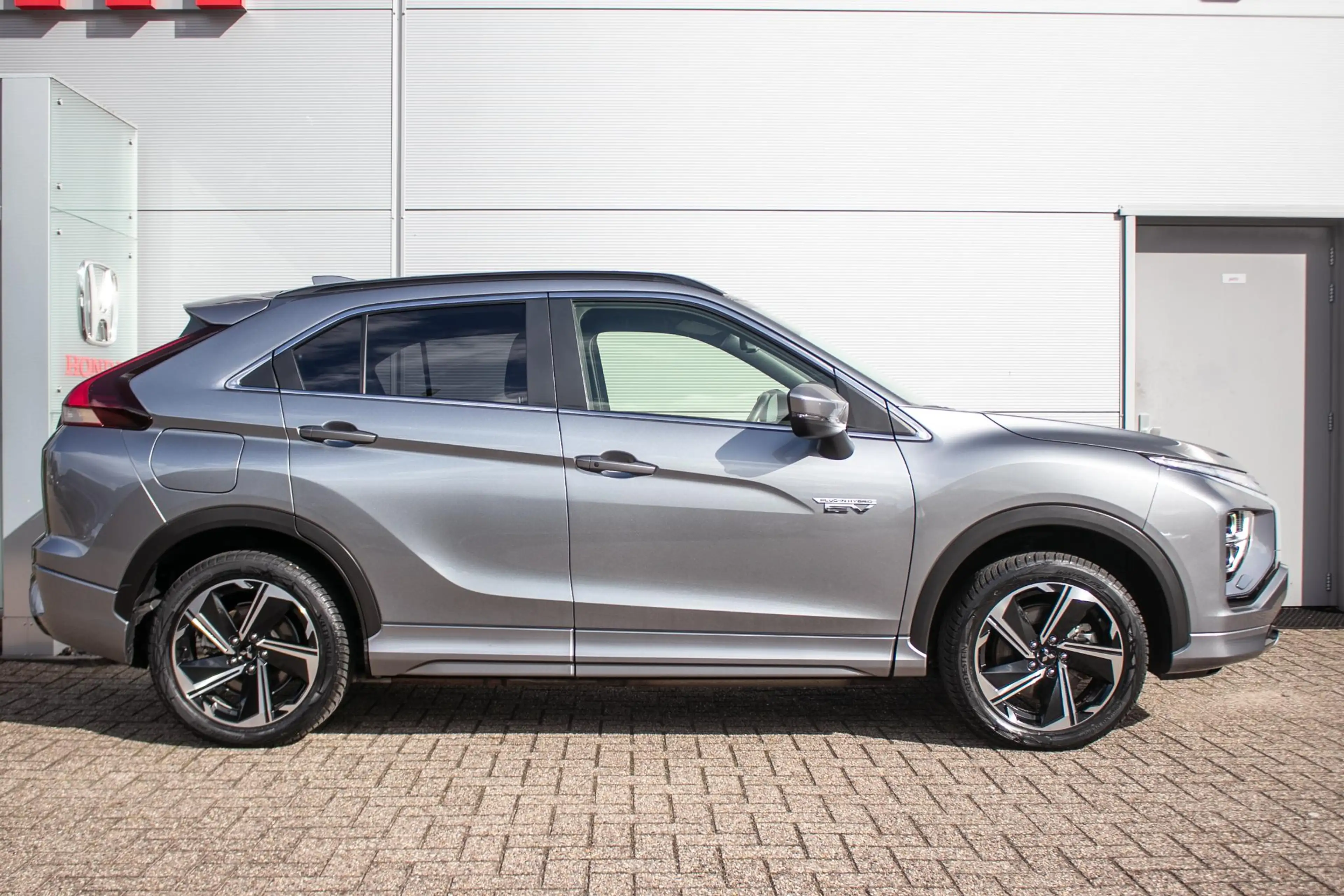 Mitsubishi Eclipse Cross 2.4 PHEV Prestige - Schuif/kanteldak | Stoel + stu — photo 11