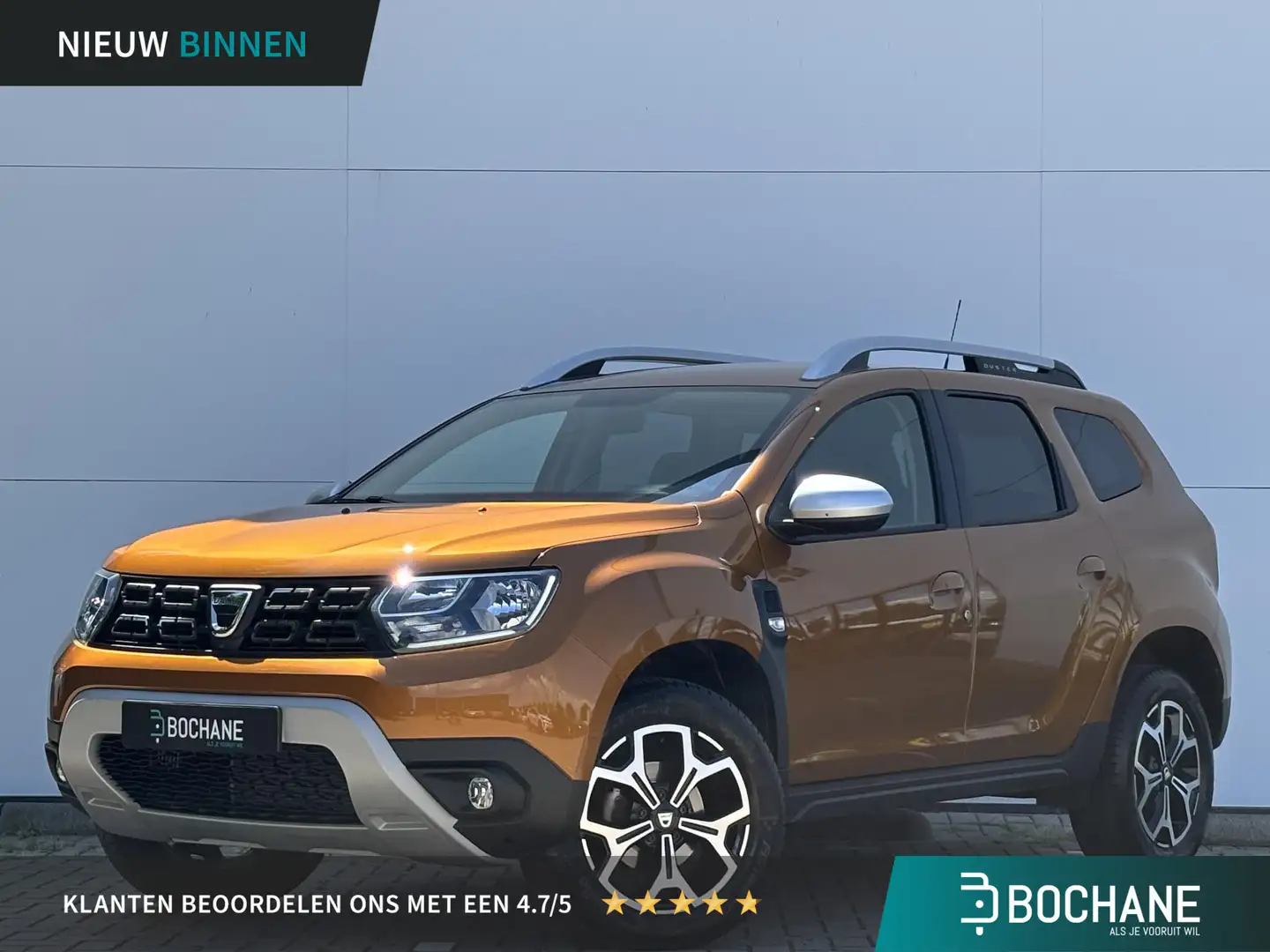 Dacia Duster 1.3 TCe Prestige / 360 Camera / Navigatie / Slecht Oranje - 1