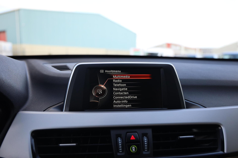 BMW X1 sDrive18i Centennial High Executive|Trekhaak|Navi| — photo 11