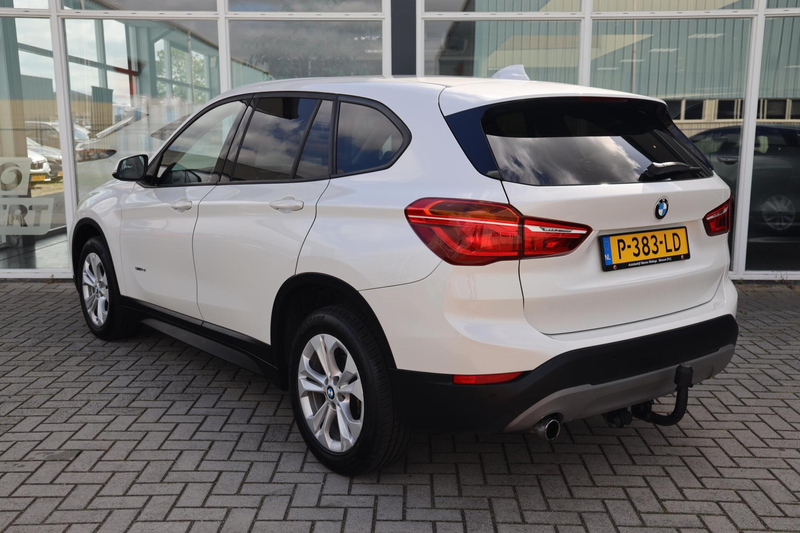 BMW X1 sDrive18i Centennial High Executive|Trekhaak|Navi| — photo 18