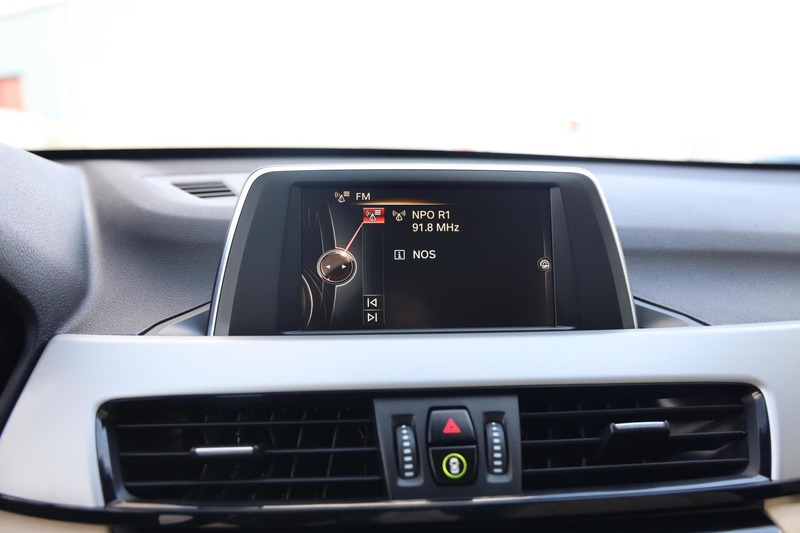 BMW X1 sDrive18i Centennial High Executive|Trekhaak|Navi| — photo 10