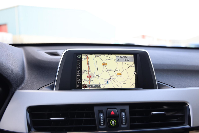 BMW X1 sDrive18i Centennial High Executive|Trekhaak|Navi| — photo 9