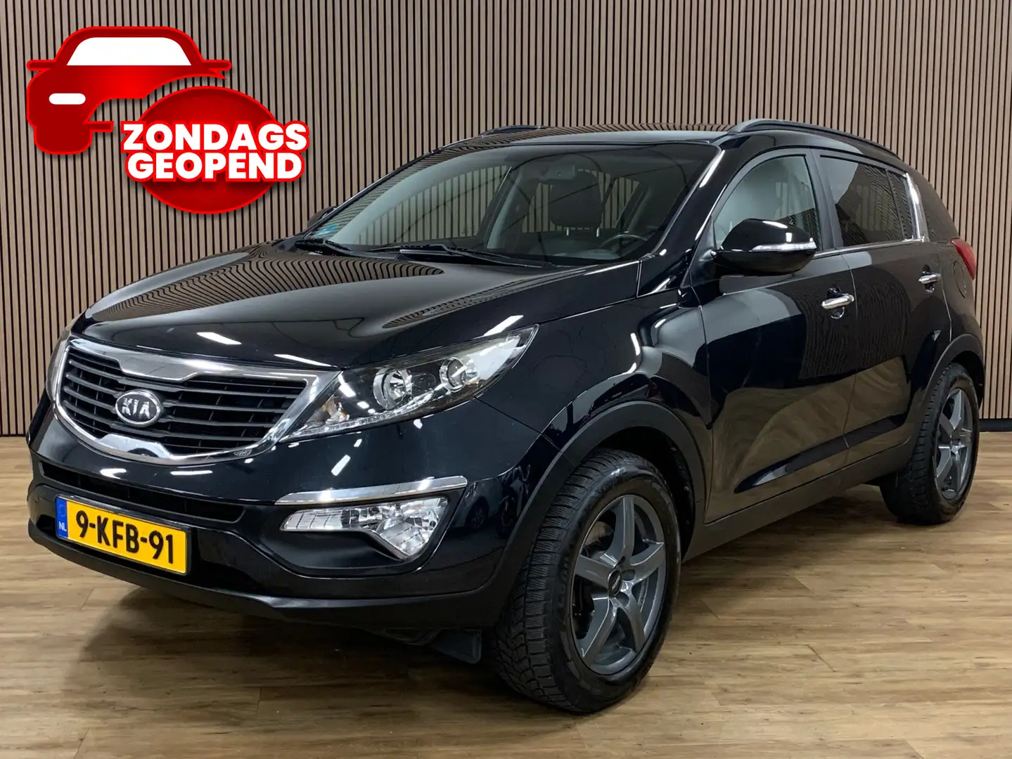 Kia Sportage 2.0 X-ecutive Plus Pack|Navigatie|Camera|Climate C Zwart - 1