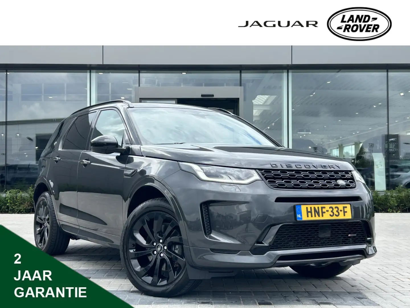 Land Rover Discovery Sport P300e 309pk AWD R-Dynamic SE | Panoramadak | Stoel Grijs - 1