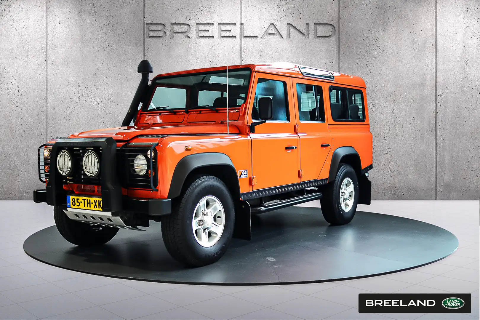 Land Rover Defender 2.5 TD5 110 G4-Edition | 9-Persoons Oranje - 1
