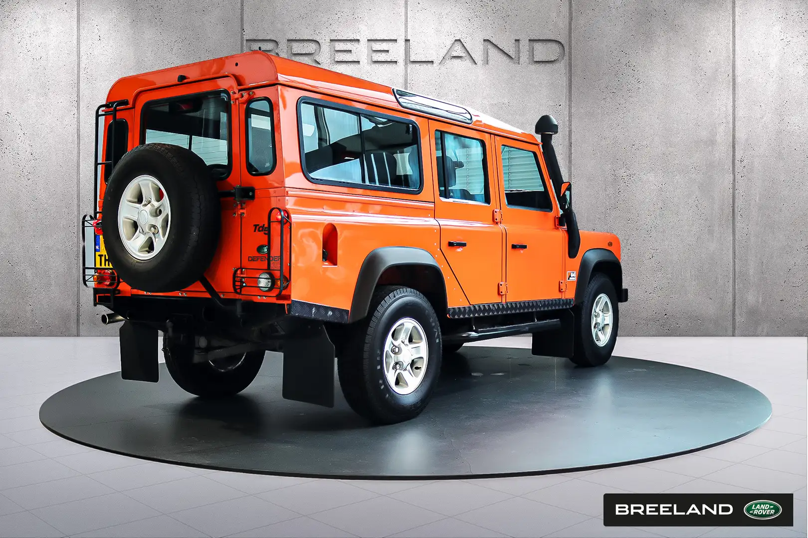 Land Rover Defender 2.5 TD5 110 G4-Edition | 9-Persoons Oranje - 2