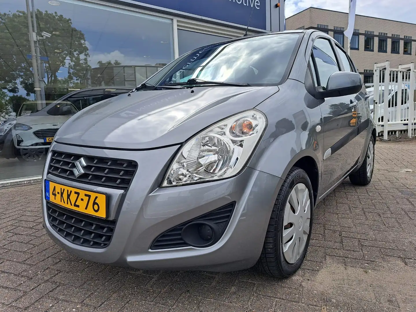 Suzuki Splash 1.0 VVT Comfort EASSS Airco / navigatie Grijs - 1