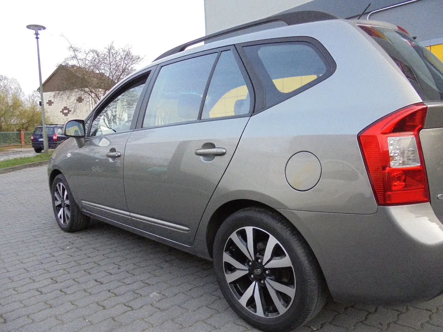 Kia Carens 2.0 CVVT Vision/1J.Gewährleistung/ Grijs - 1