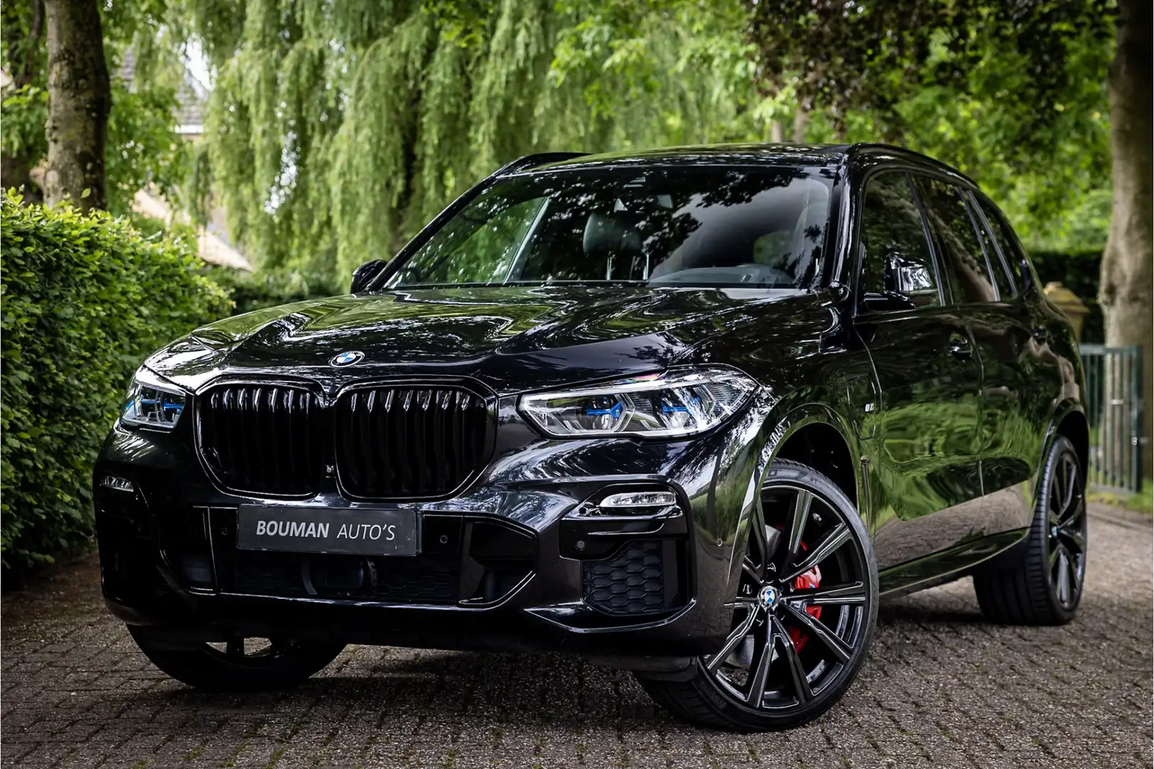 BMW X5 xDrive45e M Sport Laser 22" Individual Stoelventil Zwart - 1