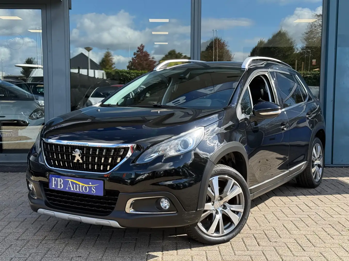 Peugeot 2008 1.2 PureTech Allure Airco Lmv Navi Cruise Camera Zwart - 1