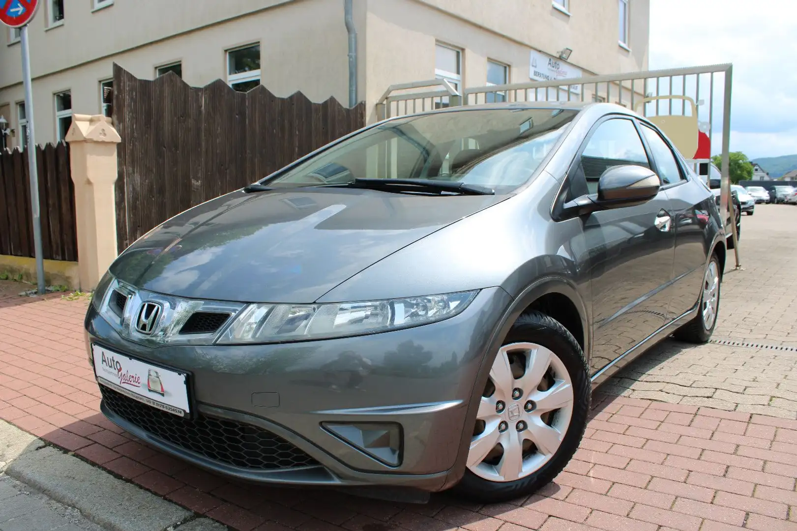 Honda Civic Lim. 5-trg. 1.4 Comfort Gris - 1
