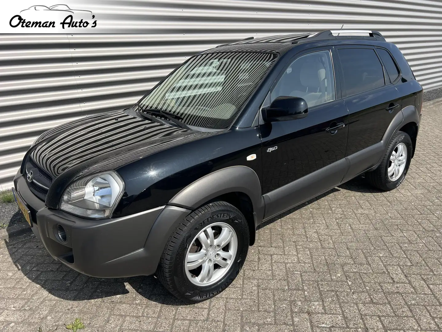 Hyundai TUCSON 2.0i 4WD Style Trekhaak Schuifdak Zwart - 1