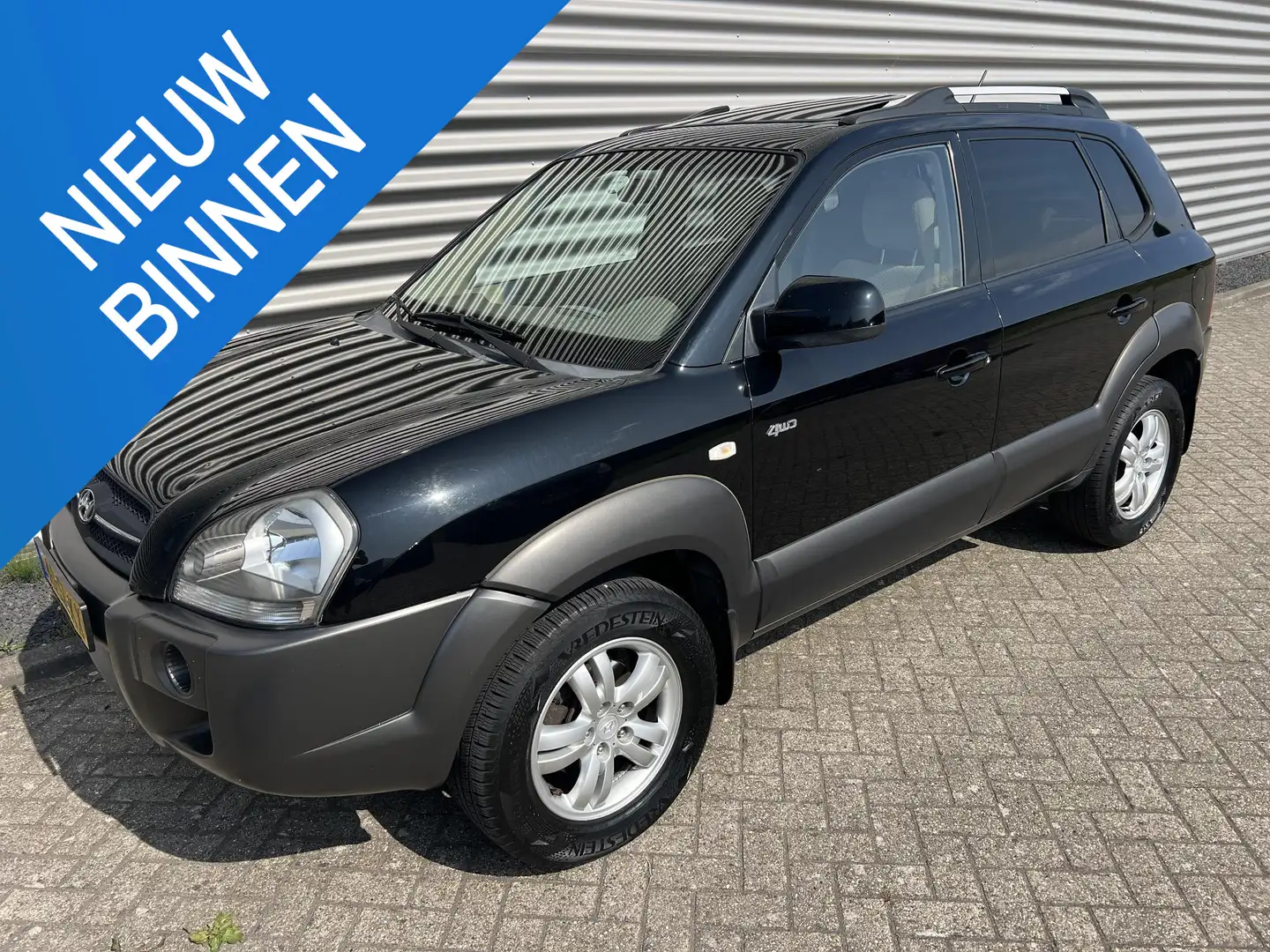 Hyundai TUCSON 2.0i 4WD Style Trekhaak Schuifdak Noir - 1