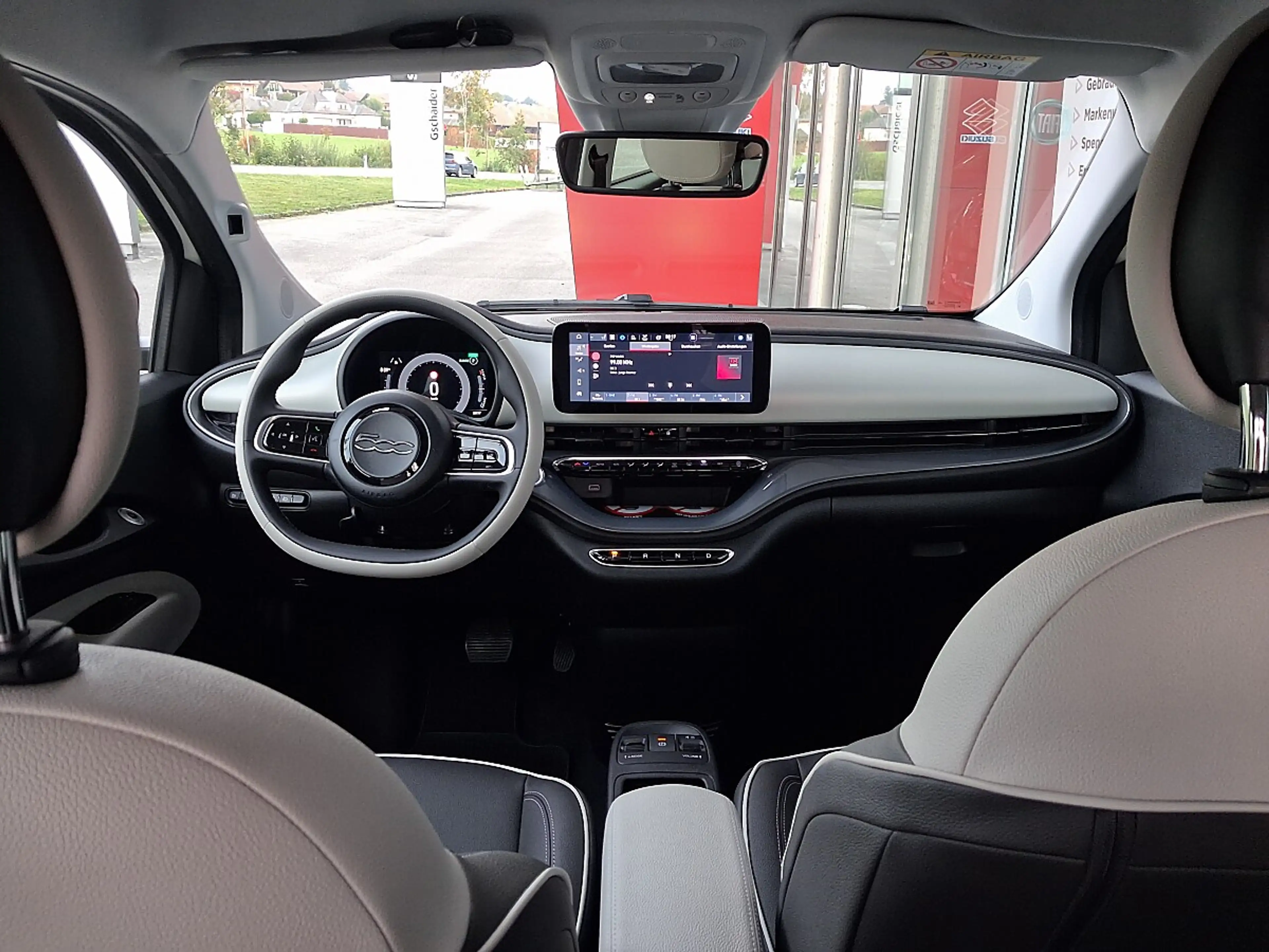 Fiat 500e La Prima — photo 9