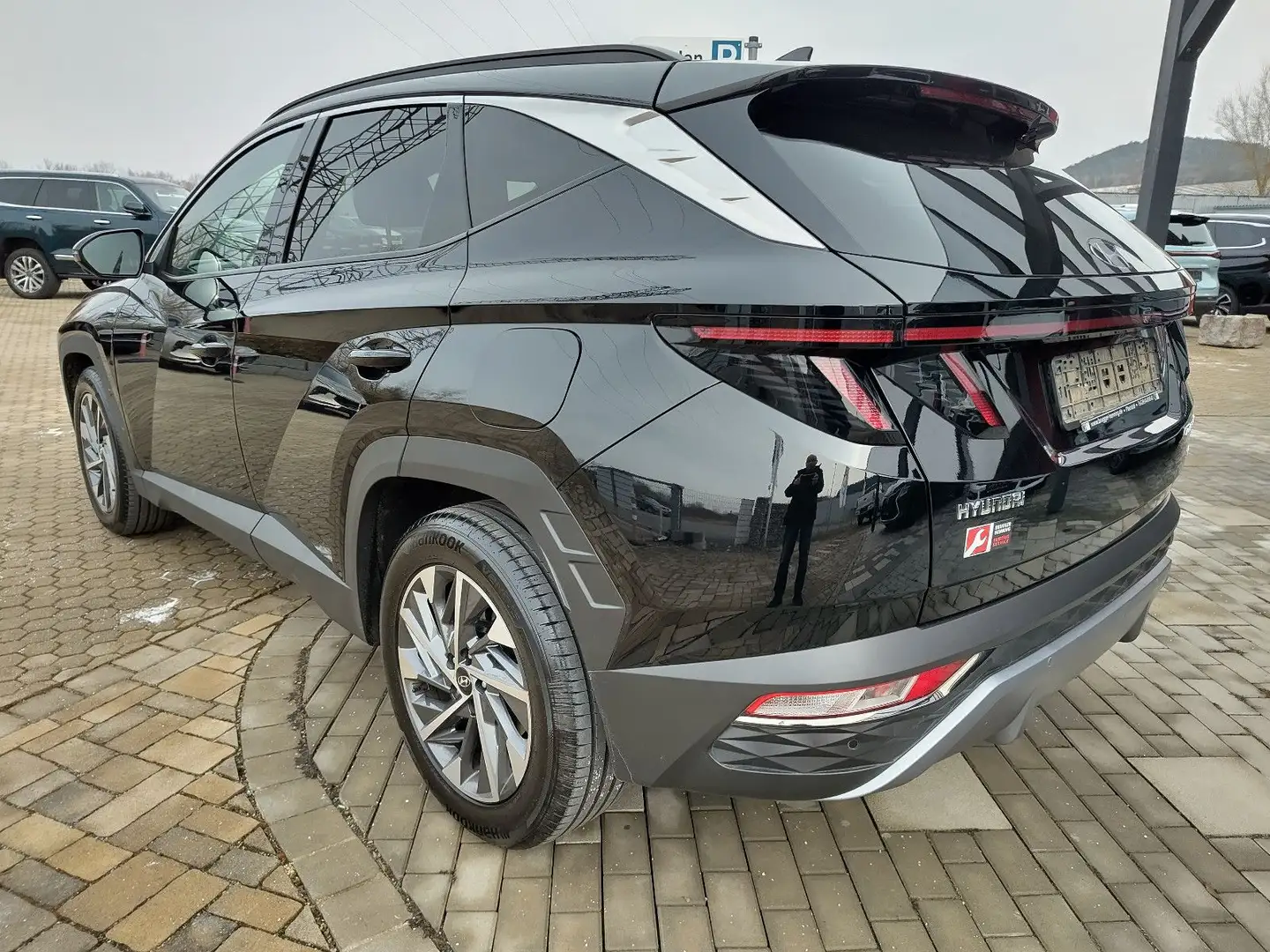Hyundai TUCSON 1.6 T-GDI 132kW 48V DCT 4WD NAVI LenkrHzg Schwarz - 1