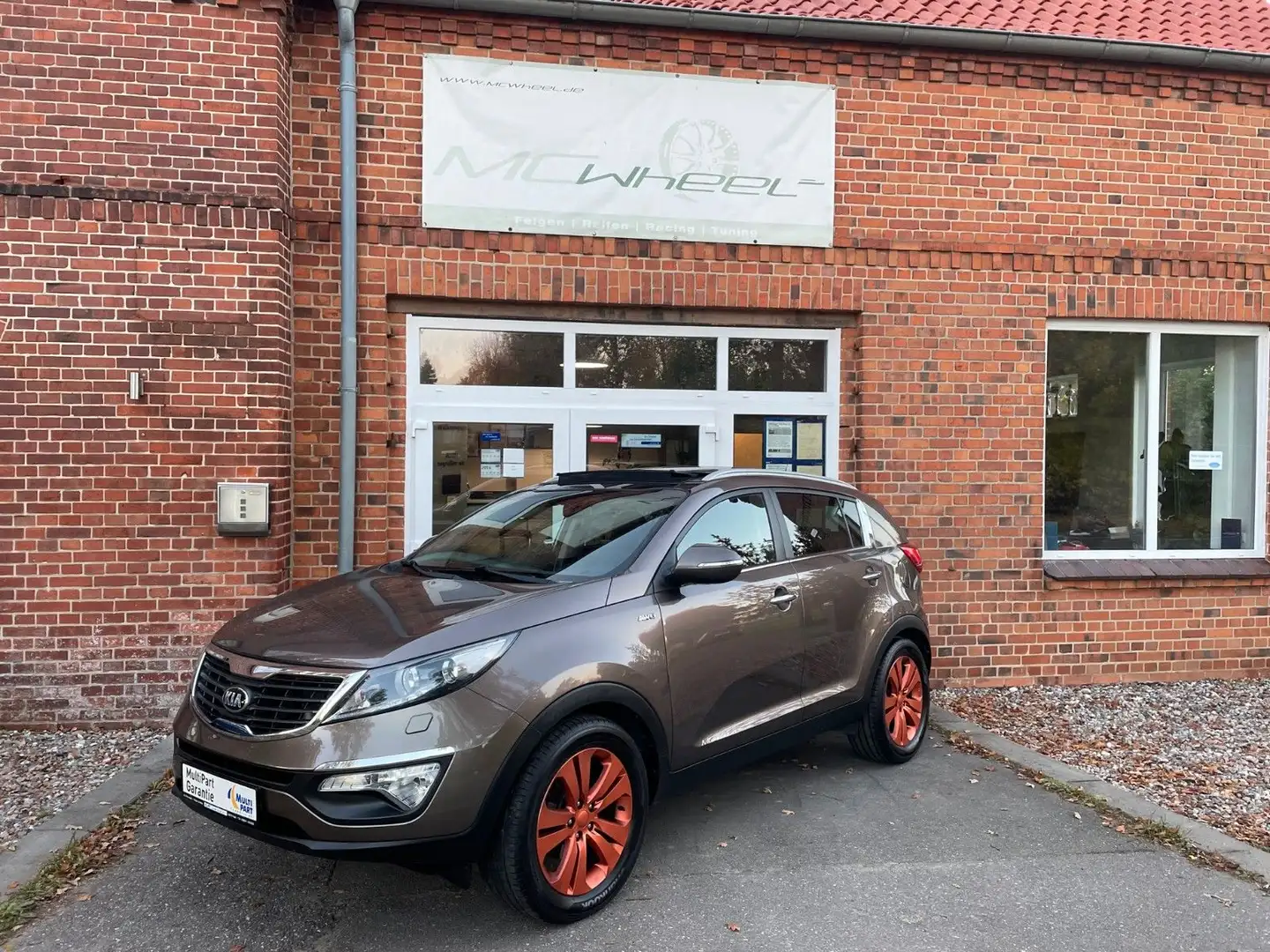 Kia Sportage Spirit 4WD VOLL+Pano+Navi+Leder+Xenon Beige - 1