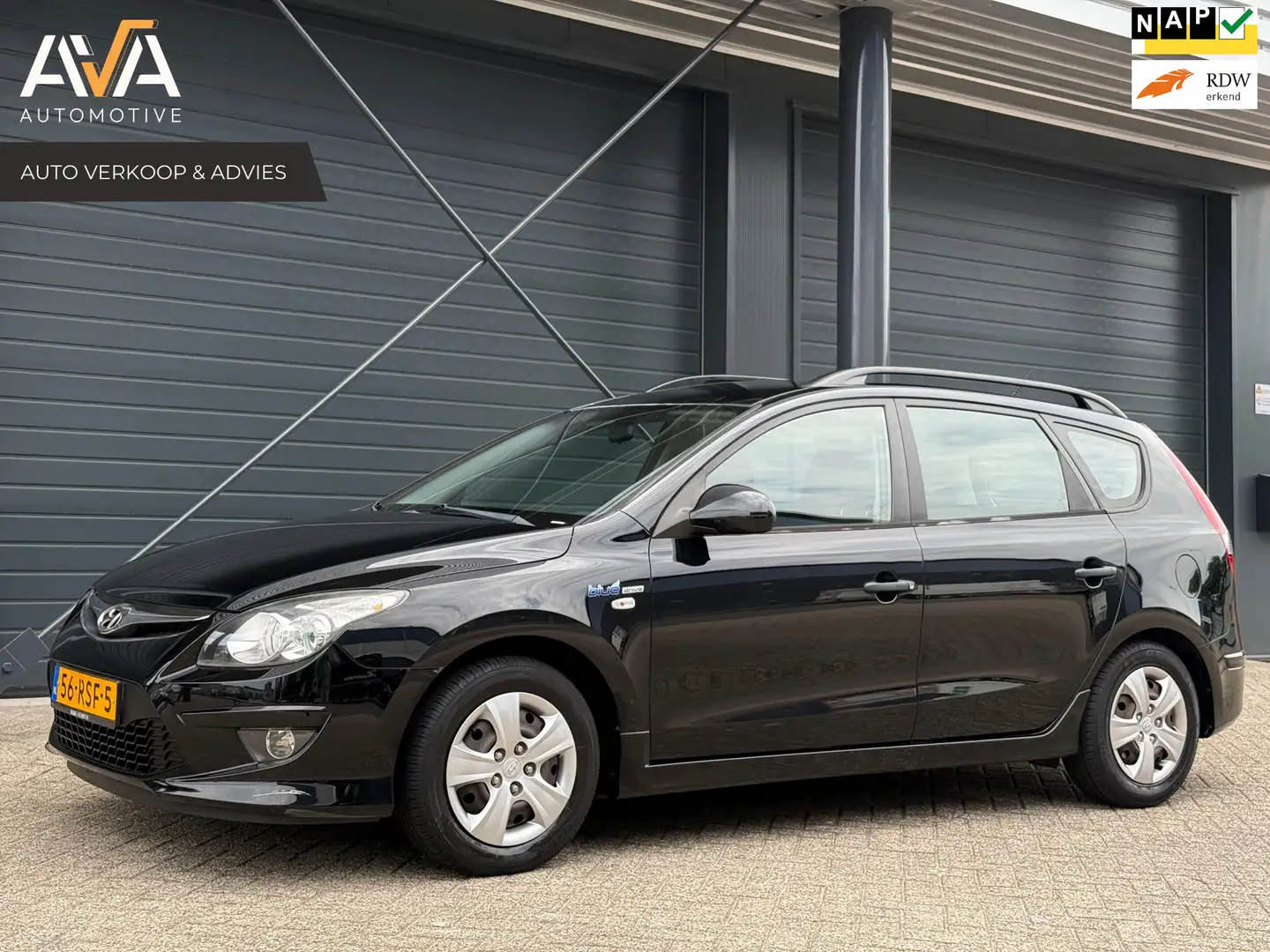 Hyundai i30 CW 1.4i i-Drive Cool, Airco, Trekhaak, NAP Zwart - 1
