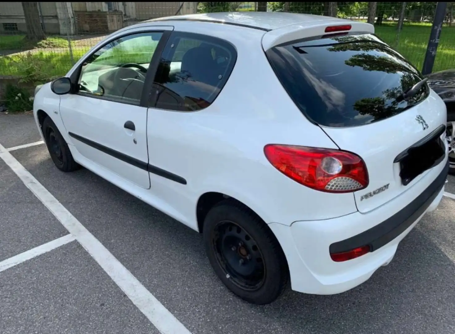 Peugeot 206 206+ Junior 1,1 Weiß - 2