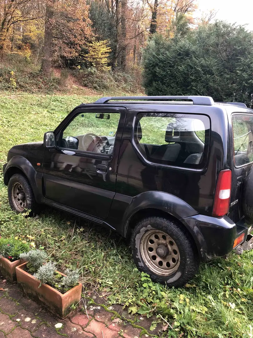 Suzuki Jimny 1.3i 16v JLX Noir - 2