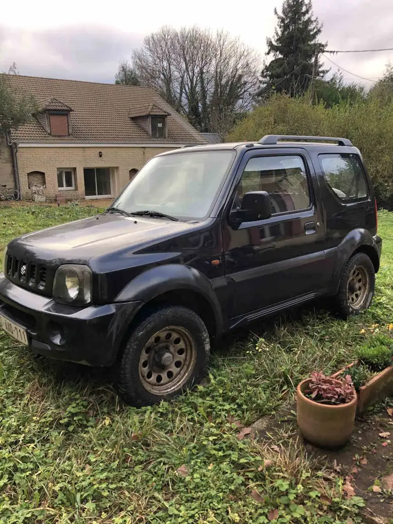 Suzuki Jimny 1.3i 16v JLX Noir - 1
