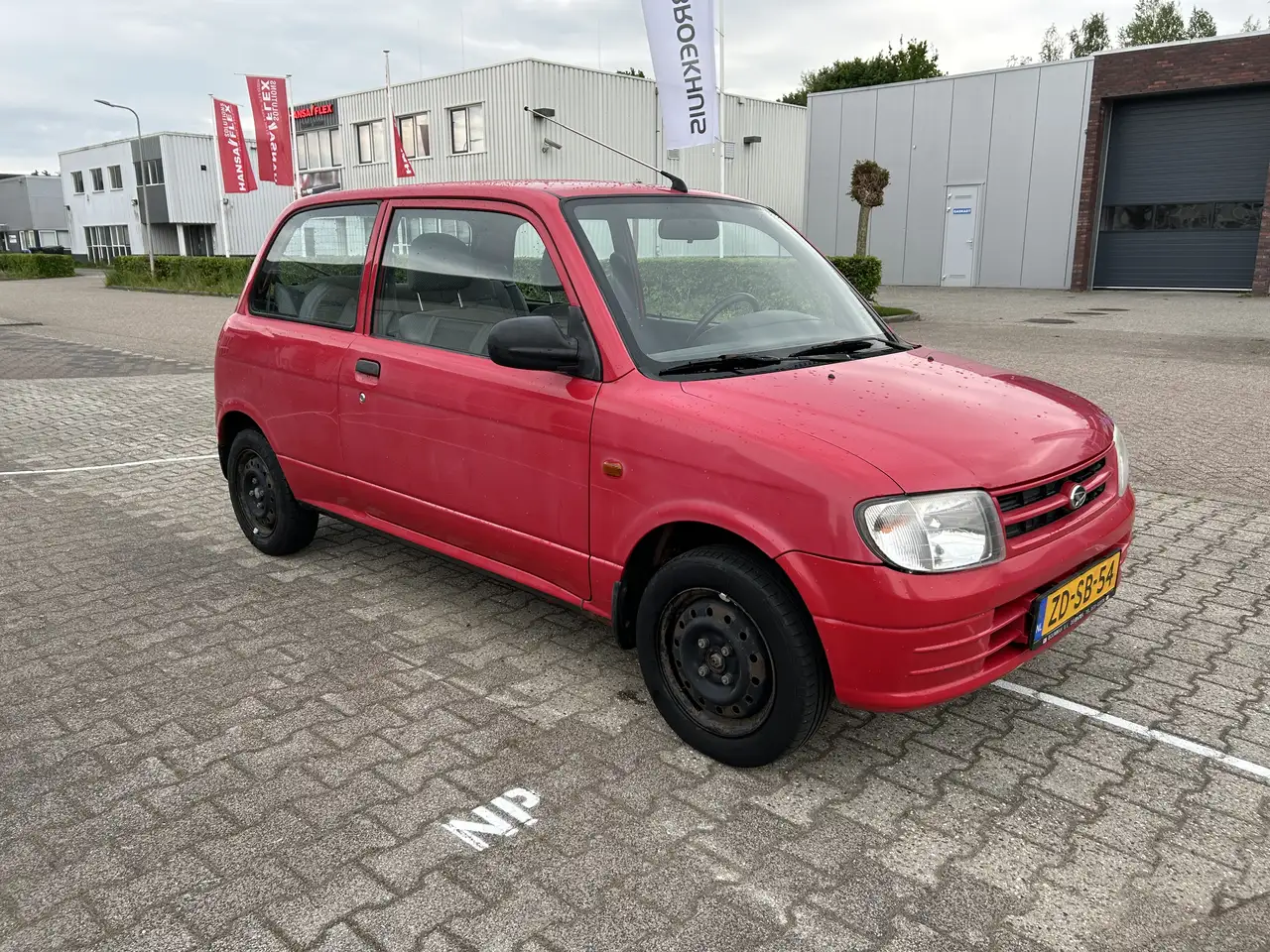 Daihatsu Cuore 1.0-12V XTi, foto 4