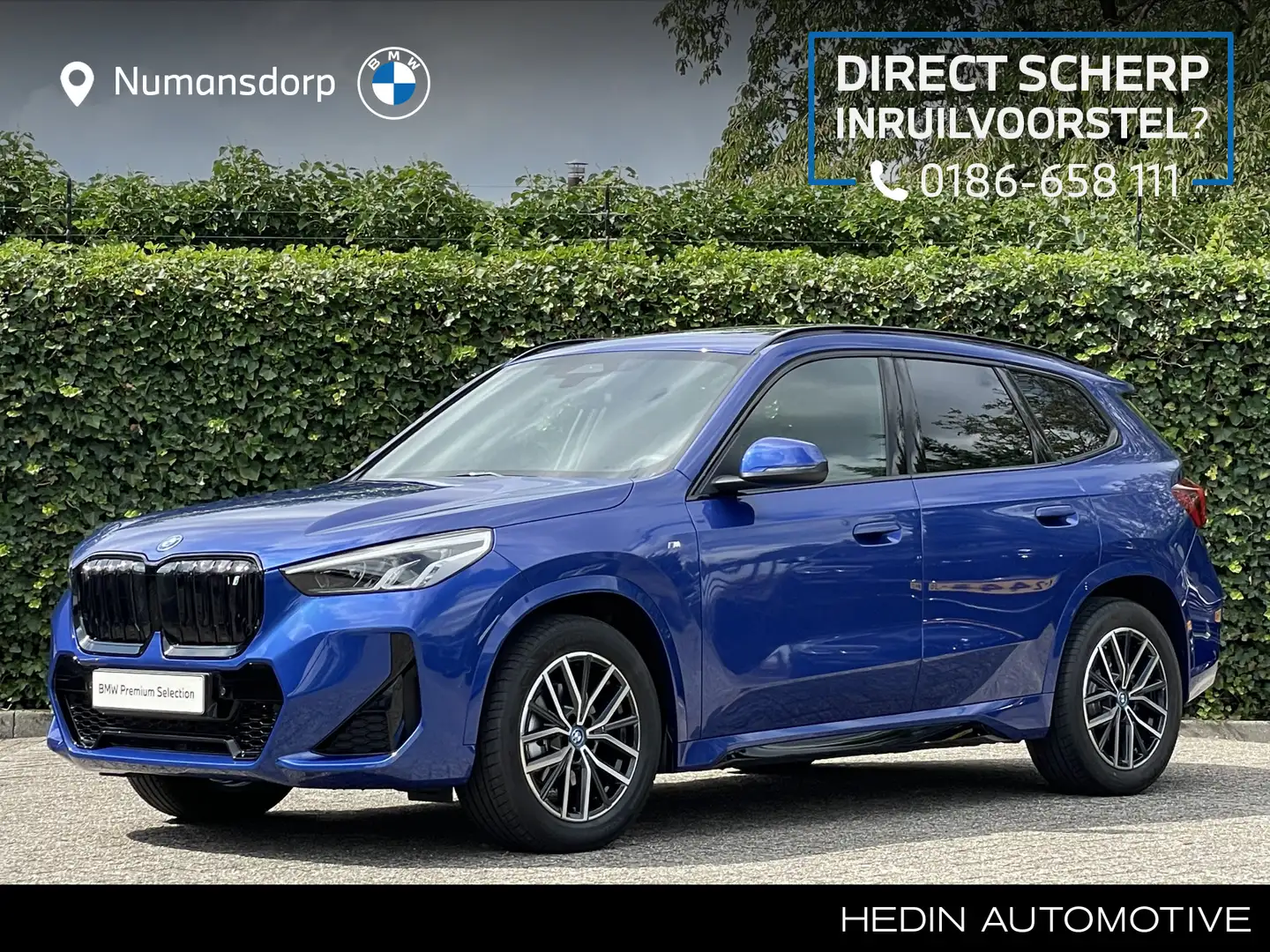 BMW iX1 eDrive20 | M-Sport | 18'' | Panorama | Getint Glas Blauw - 1