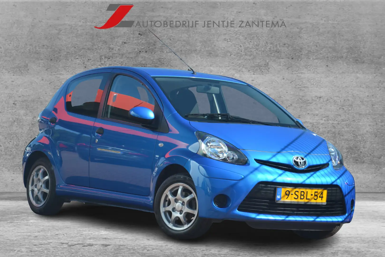 Toyota Aygo 1.0 VVT-i Now | Airco | Elek.ramen | 5.drs | LMV | Blauw - 1