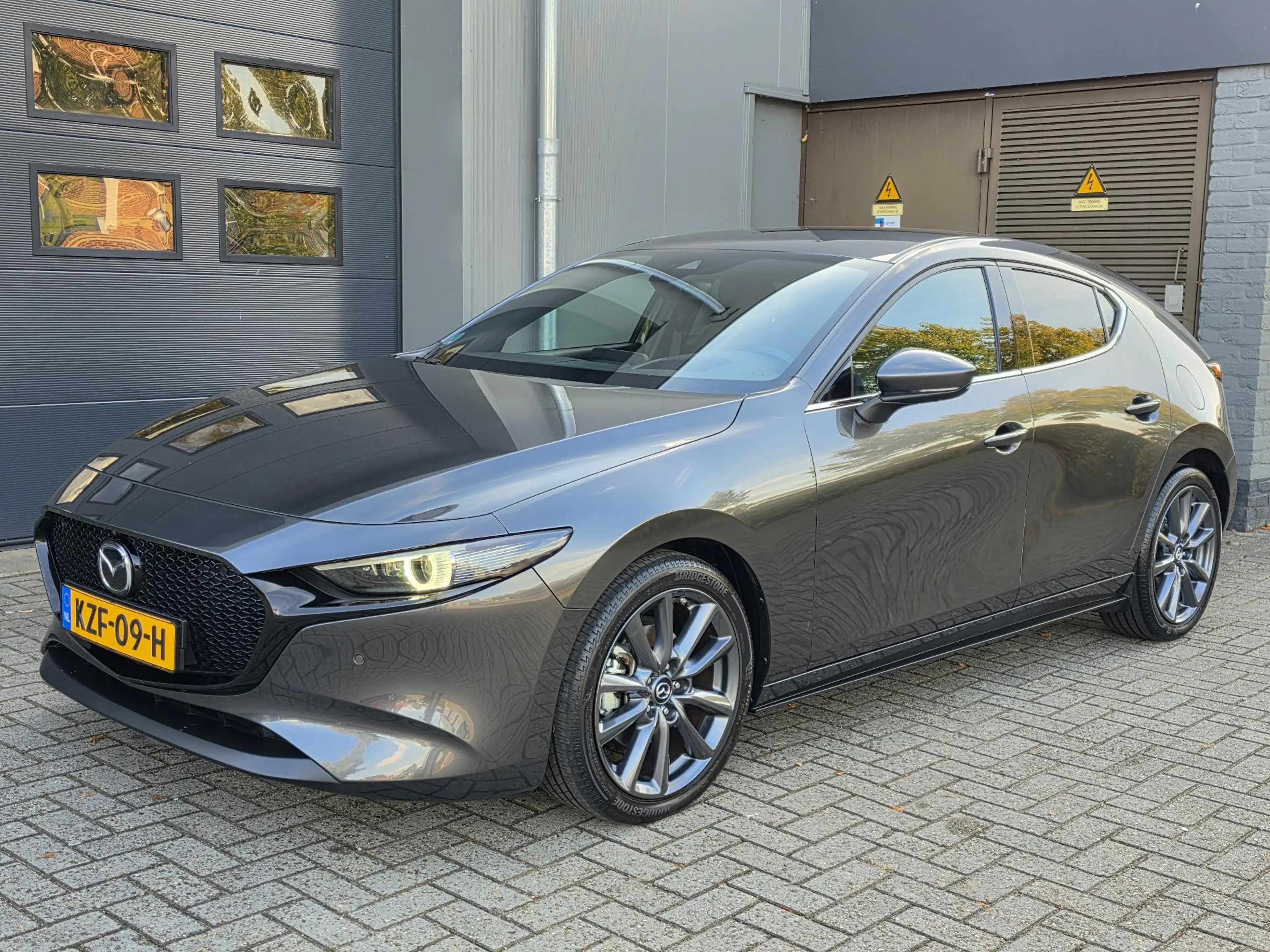 Mazda 3 2.0 e-SkyActiv-G M Hybrid 150 Luxury — photo 38