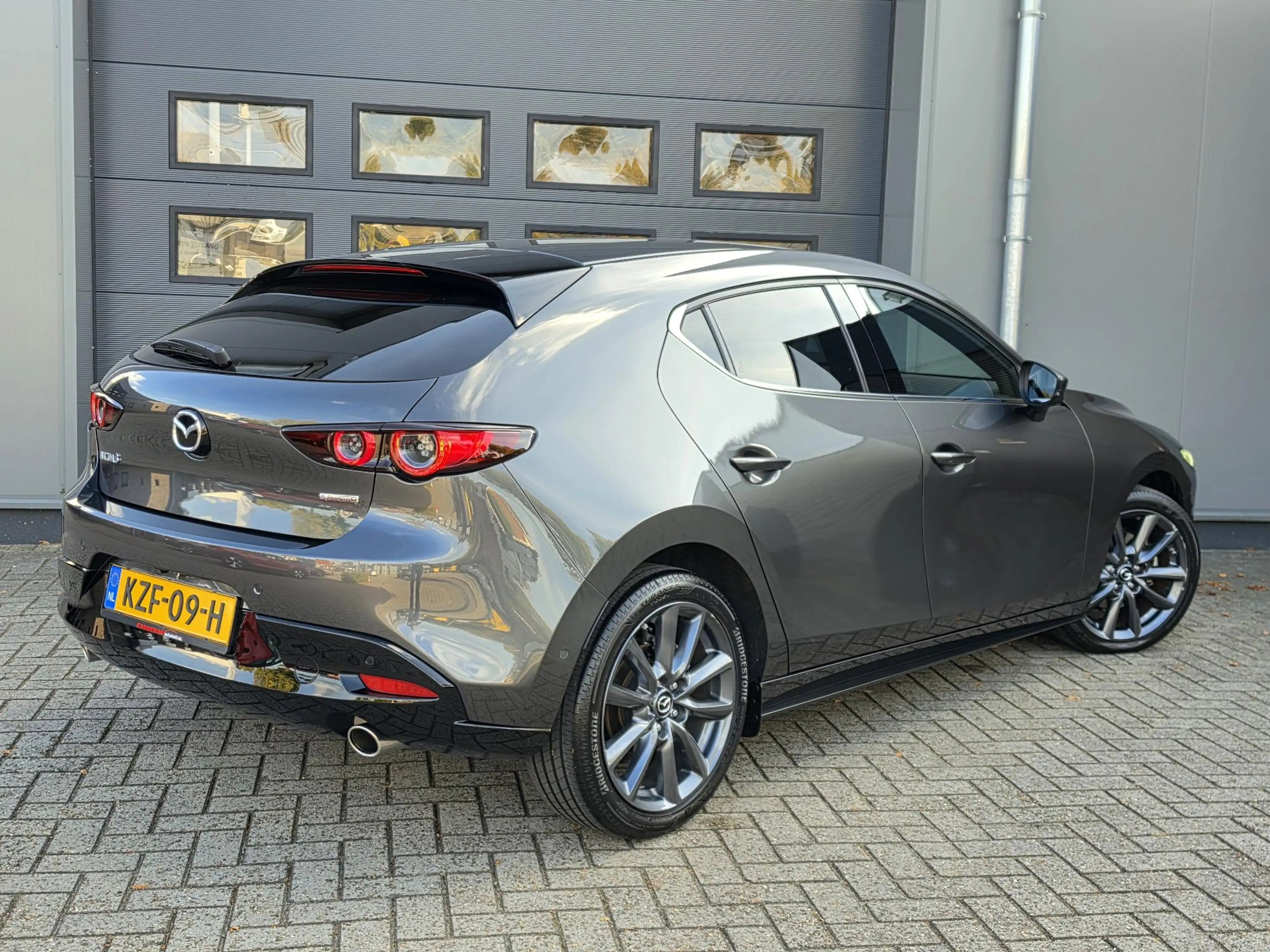 Mazda 3 2.0 e-SkyActiv-G M Hybrid 150 Luxury — photo 33