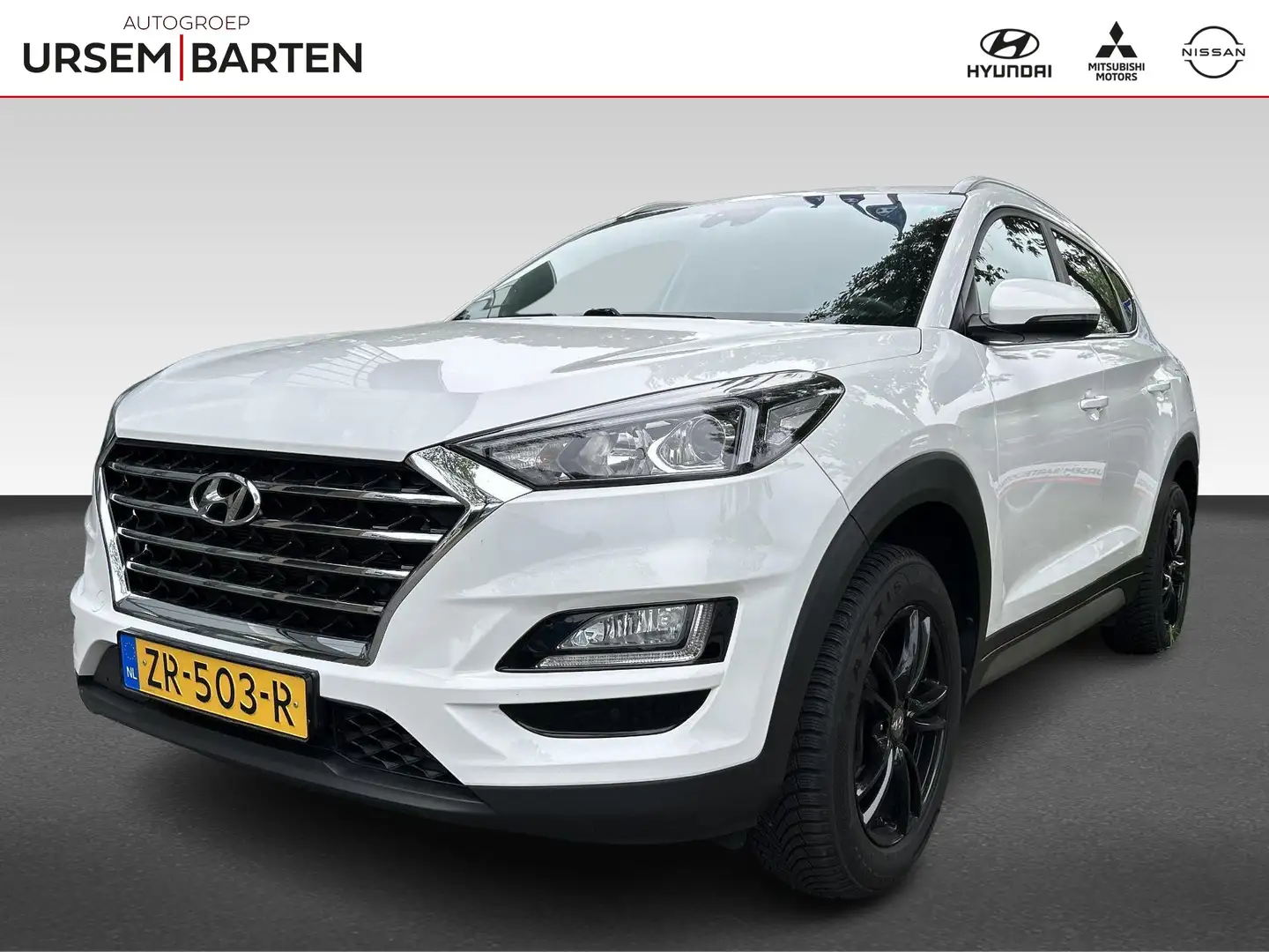 Hyundai TUCSON 1.6 GDI Comfort | navigatie | trekhaak | dealer on Wit - 1