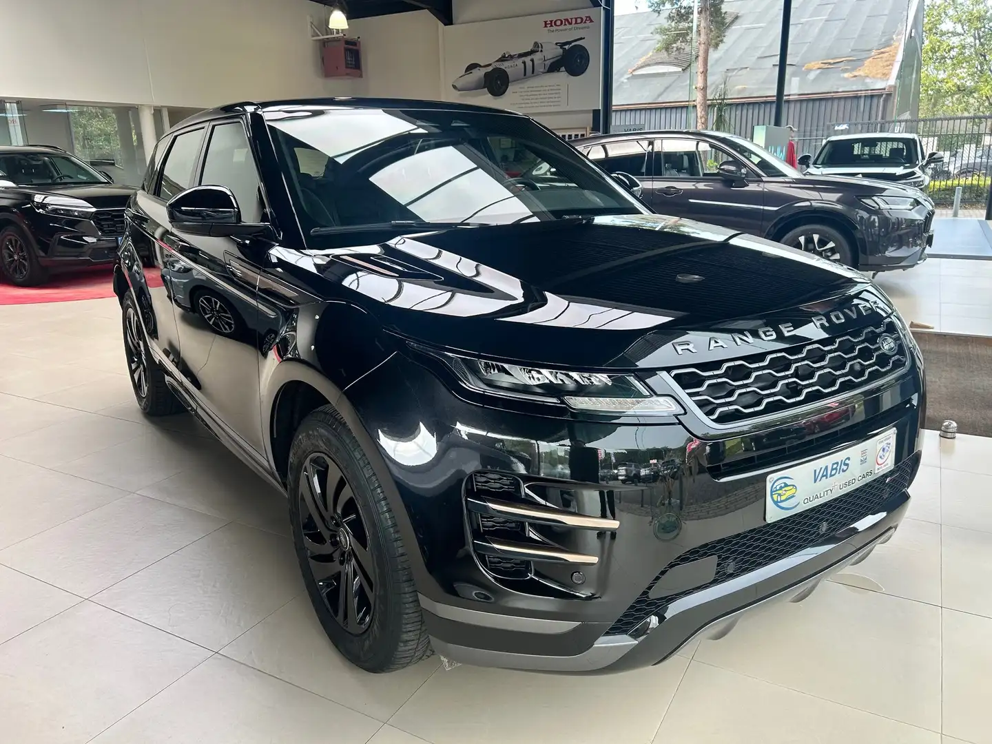 Land Rover Range Rover Evoque P300e Dynamic SE -€2251 EINDEJAAR ACTIE Zwart - 1