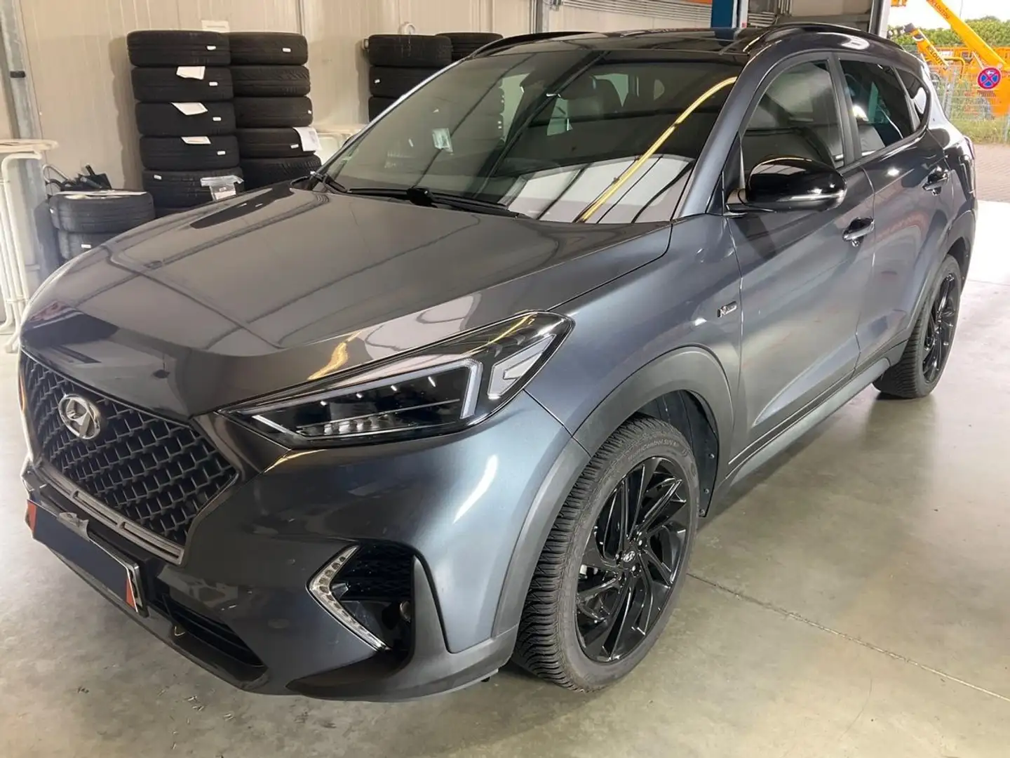 Hyundai TUCSON 1.6 TGDI N-Line 4WD *SHZ*NAV*PAN*LED*ACC* Grau - 1