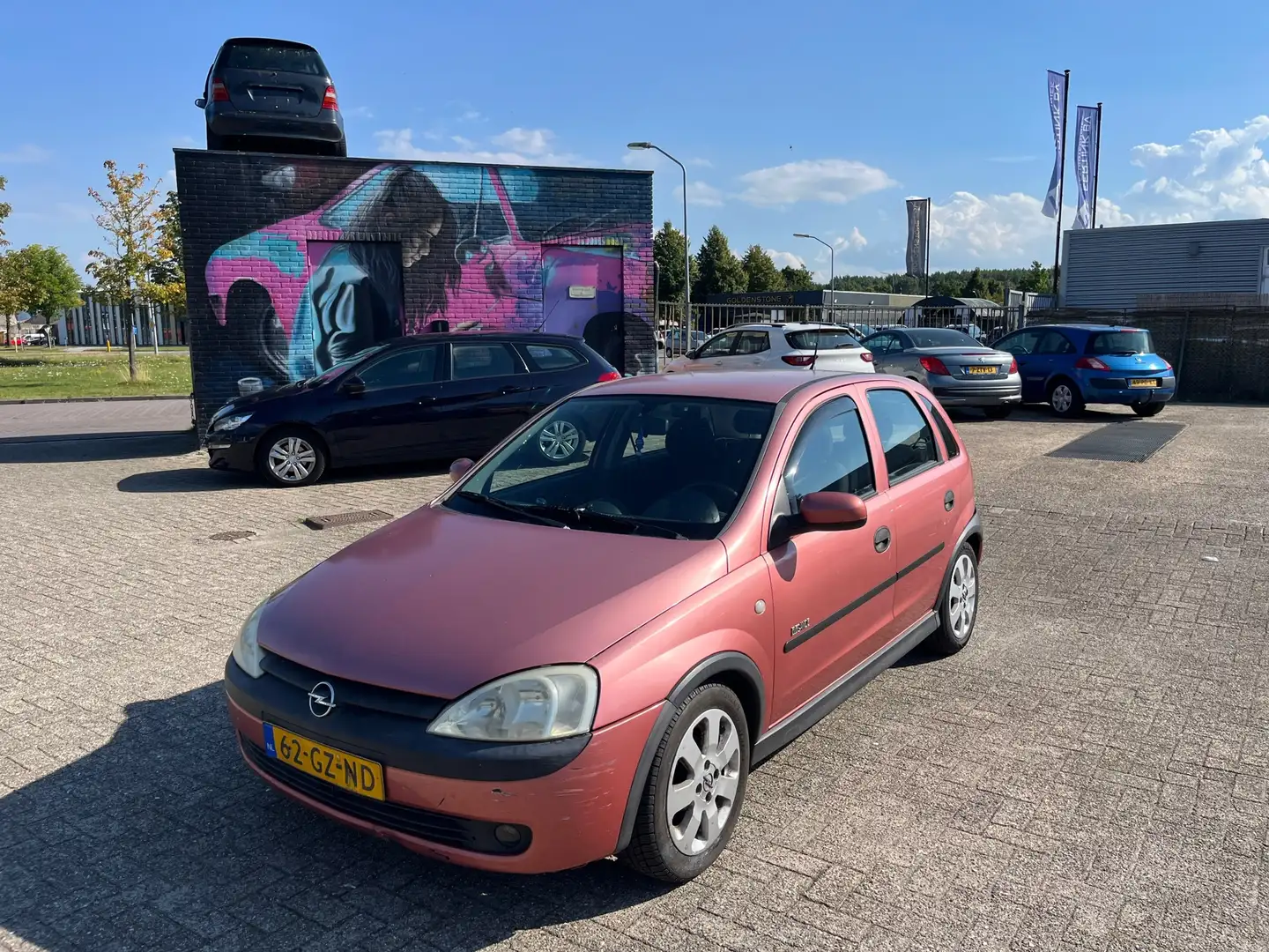 Opel Corsa 1.2-16V Elegance INCL NW Keuring! Rood - 1