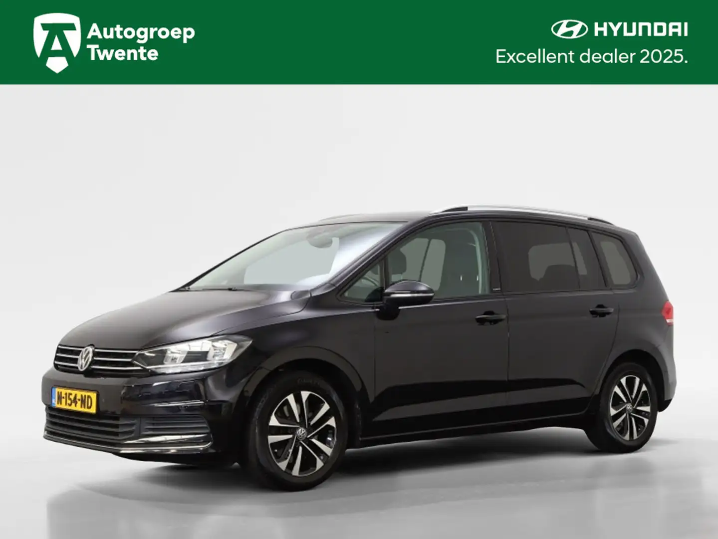Volkswagen Touran 1.0 TSI Comfortline | 7-persoons | Navigatie | Afn Zwart - 1